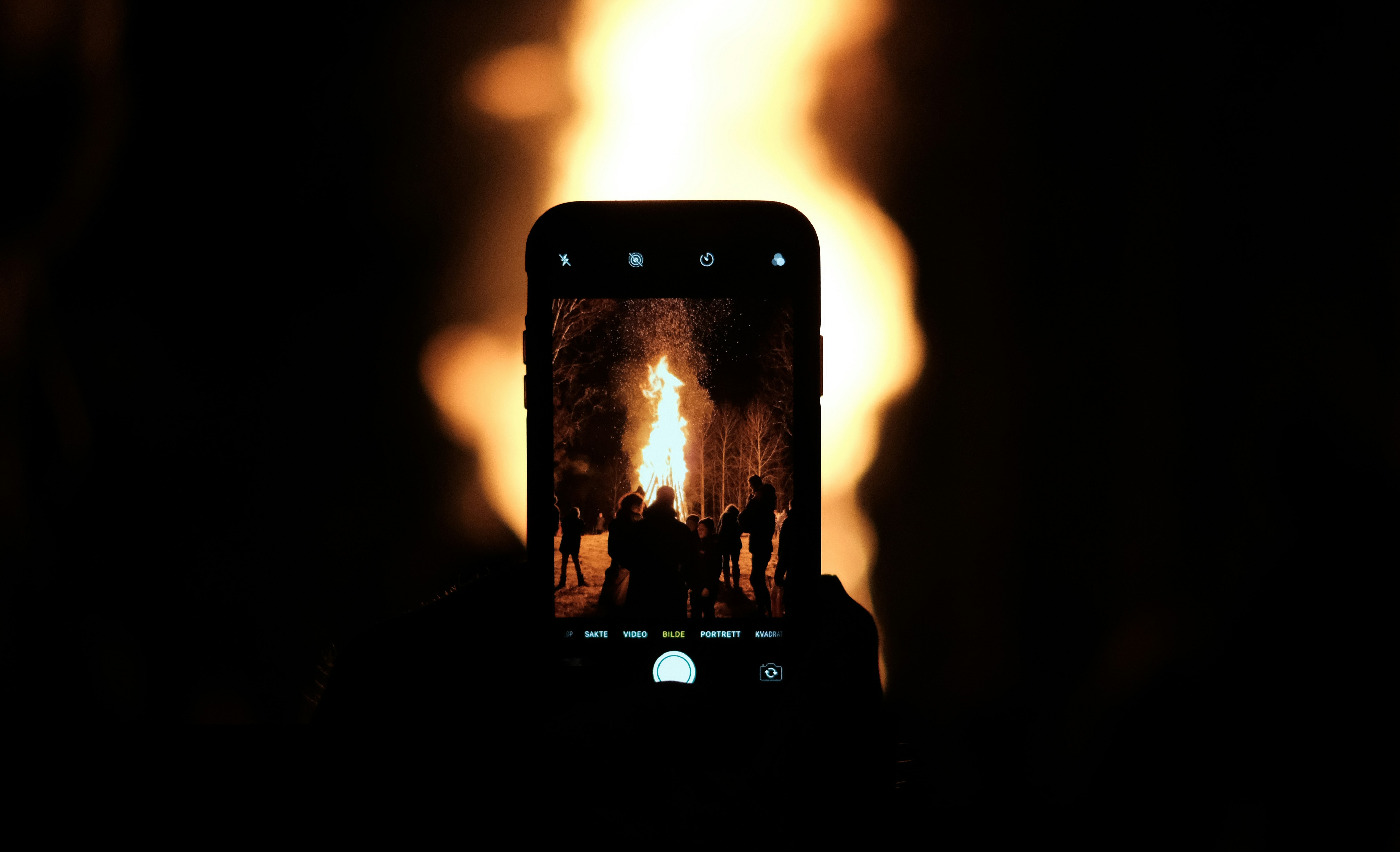 black iphone 5 showing fire